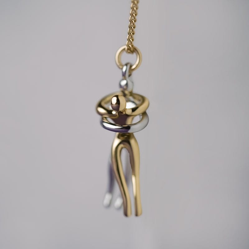 "Couple Hugging Pendant Necklace."