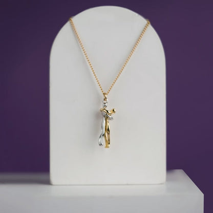"Couple Hugging Pendant Necklace."
