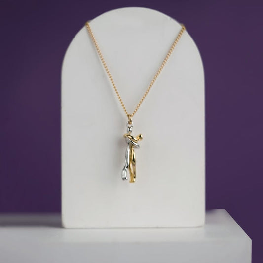 "Couple Hugging Pendant Necklace."