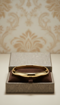 18K Sculpted Bangle With Embossed Motifs