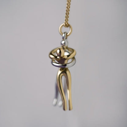 "Couple Hugging Pendant Necklace."